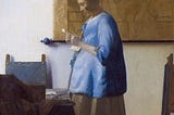 A painting of a woman in blue reading a letter.