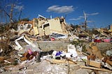 House in pieces after being destroyed by a tornado