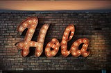 Picture of the Spanish word “Hola” which means hello in English.