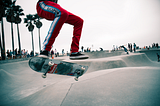 A person is performing a skating jump.