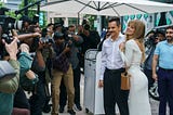 Antonio and Olivia arrive at a restaurant for lunch surrounded by paparazzi photographers