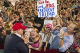 Christians hold sign for Donald, “Thanl you Lord Jesus for President Trump”