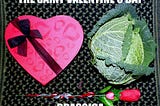 A red heart-shaped box with diagonal black ribbon and bow on the left of a savoy cabbage. An artificial rose is directly below.