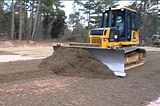 A Bulldozer used to Leveling Land