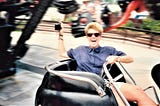 Authors sister riding a tilt-a-whirl at Bablo Island in Ohio