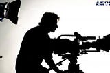 silhouette of a director directing a movie