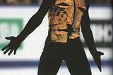 Action shot of figure skater Alexie Yagudin during his Man in the Iron Mask 2002 Olympic long program