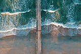 top view photo of sea waves and dock