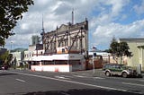 An older heritage facade having been saved while the building behind it is being demolished and redeveloped.