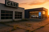 IMAGE: An abandoned, weed-covered car dealership in the foreground and a modern, glass-walled EV showroom glowing in the sunrise behind it