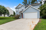 How to Match Your Garage Door to The Architectural Style of Your Home