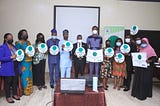 Promoting the Green Dot Logo in Oyo State.