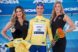 A photo of French cyclist Julian Alaphilippe and two “podium girls” at the Tour of California bike race in 2016.