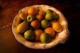 Still life of a bowl of fruit by the author.