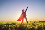 Young girl in superhero costume