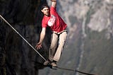 Photo of man on tightrope