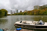 Ski boat floating on Veteran’s Park Lagoon, Milwaukee WI