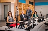 The four hosts of Morning Edition sit in the recording studio.