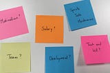 Picture of 6 post it notes with questions. Motivation? Team? Salary? Tech and kit? Development? Sprints, tests, maintenance?