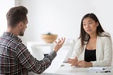 Shutterstock image 1063889165 — Caucasian men meeting with Asian woman