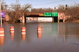 Snow and Sediment Pose Flood Risk For Kalamazoo’s Houseless Camps