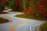 empty concrete twisting highway road