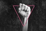 A clenched fist raised against a grey background, with a pink triangle in outline around it, as if hanging off the knuckles