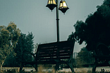 Bench in the park under lamp