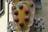 Medici family emblem on a building in Florence