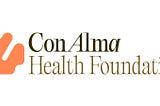 Con Alma Health Foundation Logo with a stylized yucca resembling a heart in a dark coral color on the left and Con Alma Health Foundation lettering in two shaded of brown on the right.