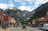 A view of beautiful mountains from the street of historic Colorado mining town of Telluride.