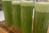 4 bottles of freshly made celery juice