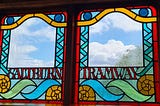 Stained glass window including the words Saltburn Tramway