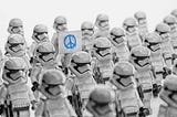 Behind The Work of “Peaceful Rebellion”