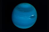 Outer Planets, Astrology, Retrograde, Planet Neptune a deep blue in outer space.