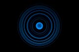 Ripple effect, blue circle on black background