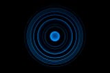 Ripple effect, blue circle on black background