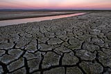 Cracked ground during a sunset