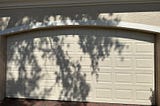 white garage door insured