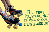 A banner stating “The Most Powerful Muse Of All Is Our Own Inner Child” next to a pair of roller-skates.