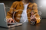 Zero Trust Enterprise Architecture Photo — Person in front of a laptop computer