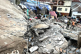 Eight dead, dozens fear trapped after building collapses