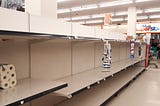 Empty shelves in the toilet paper aisle of an Atlantic Superstore supermarket of Halifax, Nova Scotia, Canada, on 12 March 20