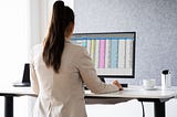 Integrating Technology with Your Sit-Stand Desk for a Smart Office Experience