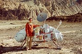 Carl Sagan with a model of NASA’s Viking lander