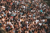 A crowd of people cheering.