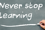 Chalkboard with the words Never stop Learning with Learning underlined