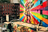 Street art that is bright and colorful, attention grabbing.