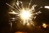 A picture of a New Year’s sparkler ignited.