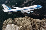 Air Force One flying over Mount Rushmore